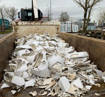 Skip filled with ceramic waste